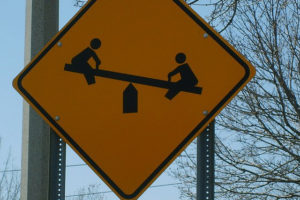 Seesaw sign
