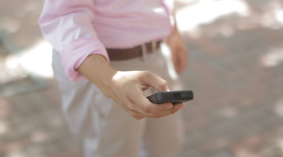 Man looking at cell phone